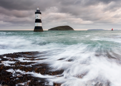 Penmon Point lighthouse on the isle of Anglesey photographed at dawn.