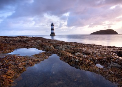 Penmon Point Lighthouse at sunrise on the isle of Anglesy in North Wales