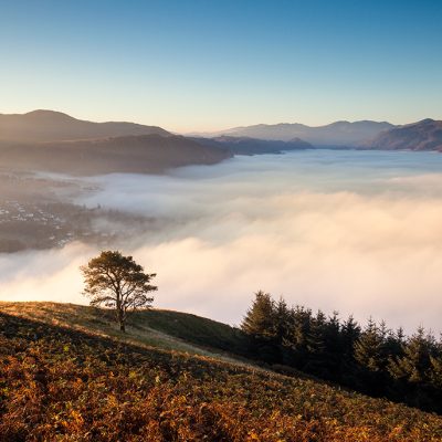 Landscape image of a misty valley in the Lake District