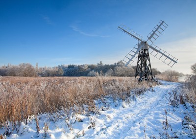 Traditional Skeleton mill of Boardmans on the Norfolk Broads in wintry weather