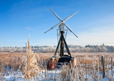 Traditional Skeleton mill of Clayrack on the Norfolk Broads in wintry weather