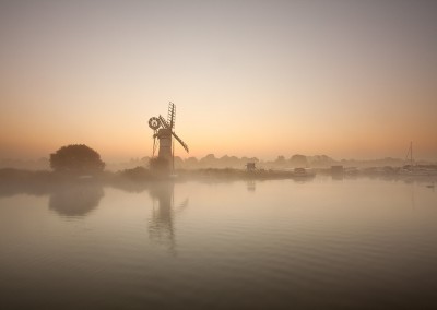 Thurne Drainage Mill on a misty morning on the Norfolk Broads