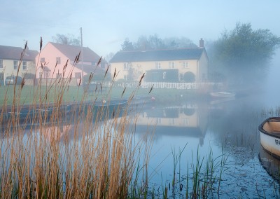 Picturesque village of West Somerton on a misty morning on the Norfolk Broads