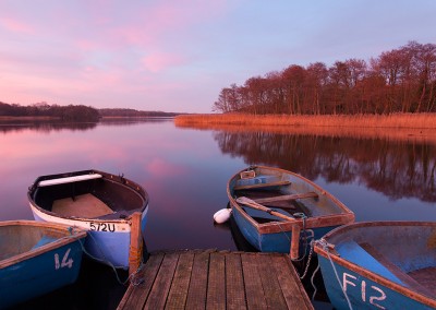 Rowing boats and Jetty at Ormesby Little Broad on the Norfolk Broads
