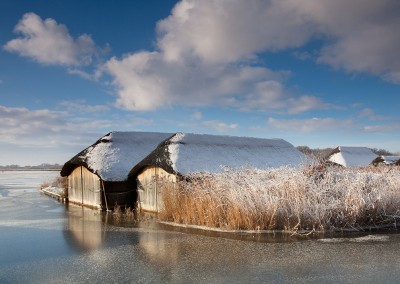 Thatched Boathouses on Hickling Broard, Norfolk Broads