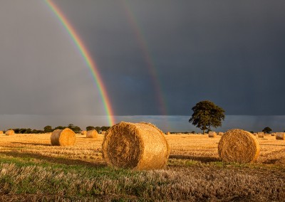 Rainbow over a freshly harvest Barley Field
