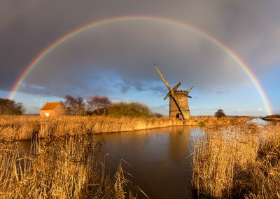 Derelict mill and rainbow on the Norfolk Broads