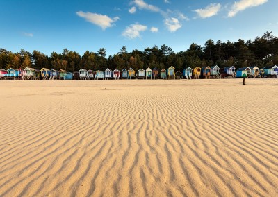 Wells beach looking towards the beach huts on the Norfolk Coast