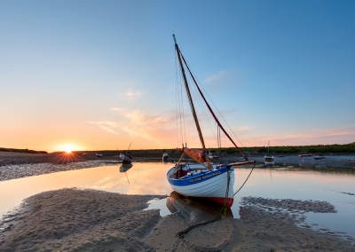 Sailing boat at Burnham Overy Staithe on the North Norfolk Coast