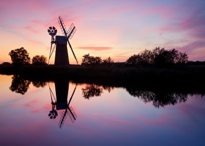 Turf Fen windmill at sunset on the River Ant, Norfolk Broads