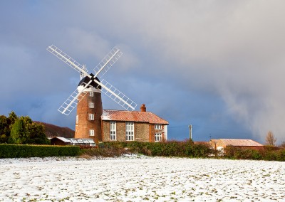 Weybourne windmill following winter snowfall in Norfolk