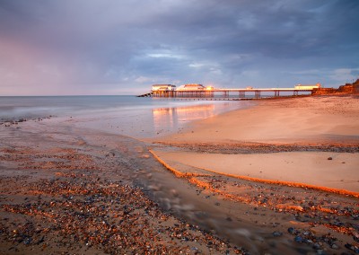 Stomy light over Cromer Pier shortly before sunset on the North Norfolk Coast