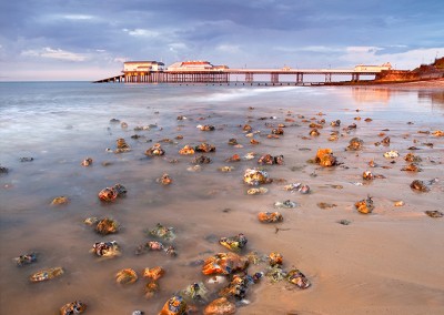 Stomy light over Cromer Pier shortly before sunset on the North Norfolk Coast