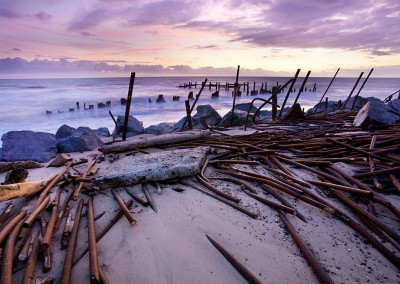 The remains of the now damaged sea defences at Happisburgh on the Norfolk Coast