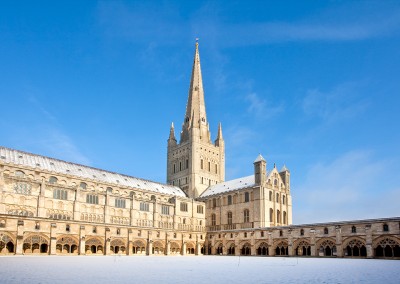 Norwich Cathedral on a bright sunny day following Winter Snowfall