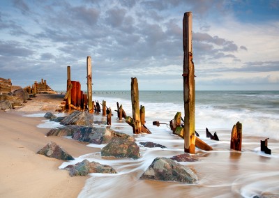 The remains of the now damaged sea defences at Happisburgh on the Norfolk Coast