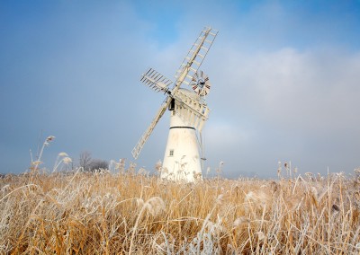 Thurne windmill on a frozen day following a winter Hoarfrost on the Norfolk Broads