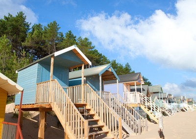 Beach huts on the beach at Wells Next The Sea on a summer morning